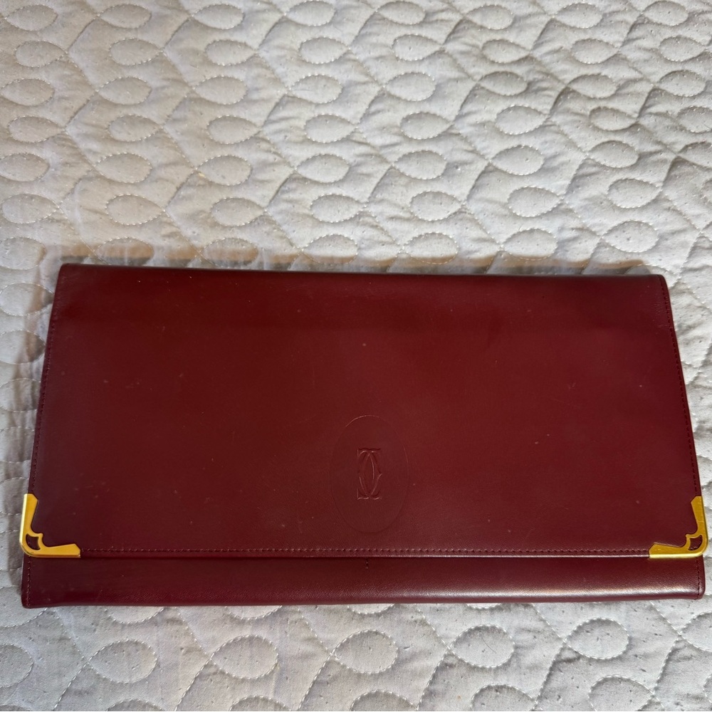 Cartier Burgundy Clutch with Gold Accents